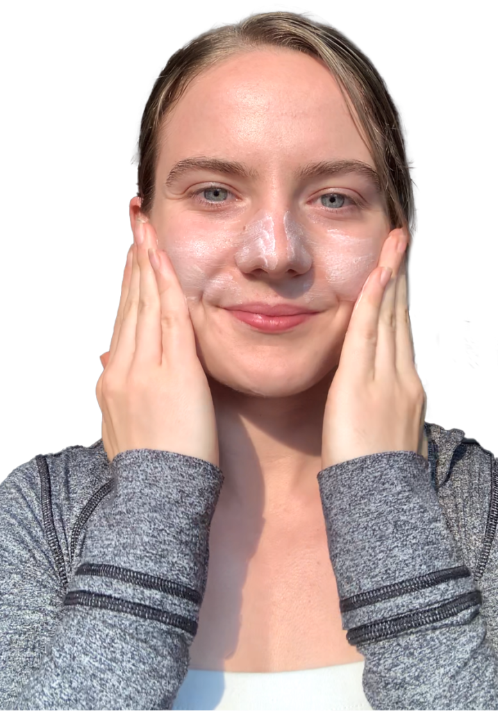 person applying tretinoin to their face